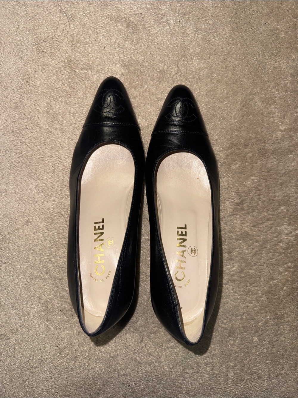 CHANEL Black Leather Pointed Cap-Toe Pumps